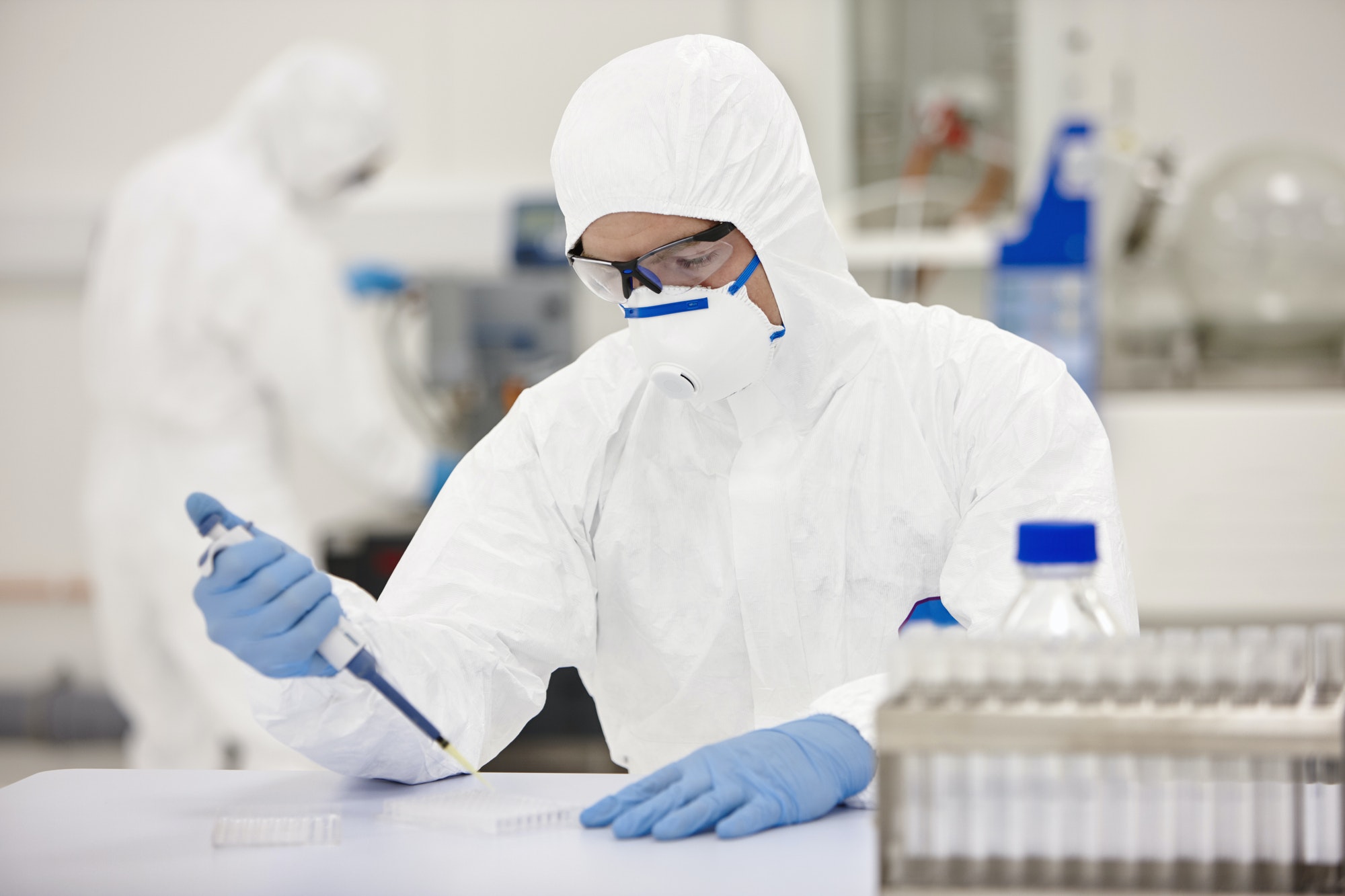 Scientists working in laboratory