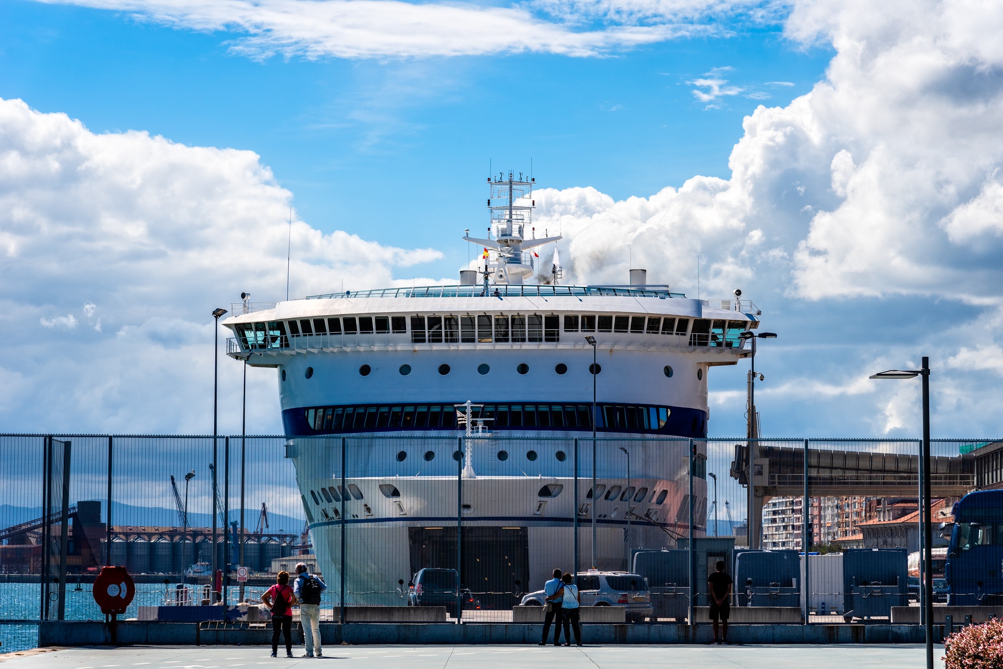 Ferry ship loading cars in the terminal of a port